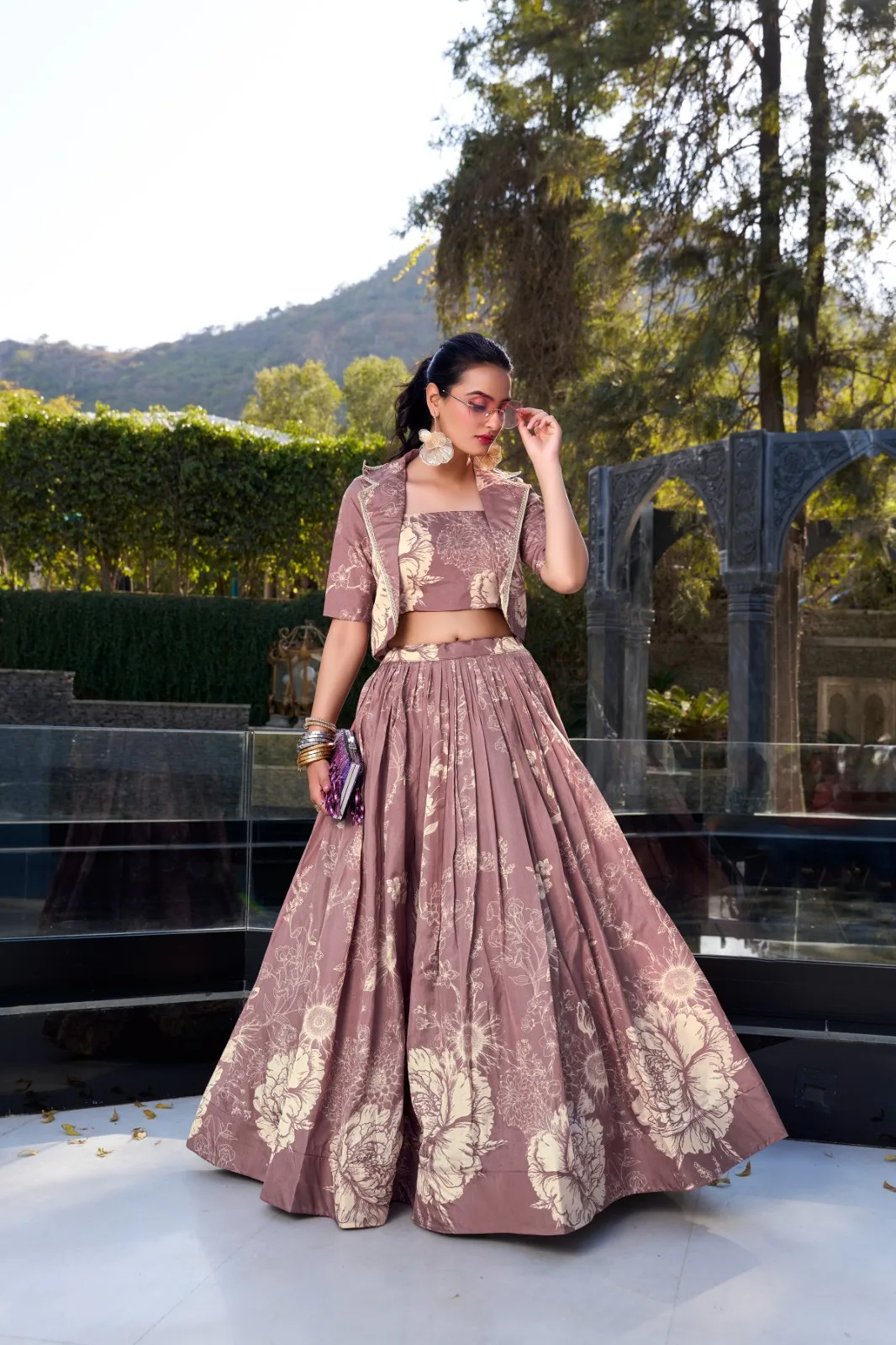 Elegant Tussar Silk floral print wedding lehenga set with blouse and koti Stitched Tussar Silk lehenga with can-can and tassels, perfect for weddings Floral print Tussar Silk blouse and koti for traditional bridal outfits Heavy flare Tussar Silk lehenga in blooming charm design for festive occasions