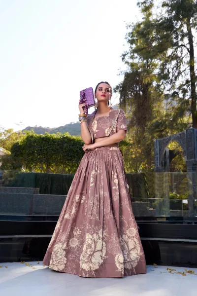 Elegant Tussar Silk floral print wedding lehenga set with blouse and koti Stitched Tussar Silk lehenga with can-can and tassels, perfect for weddings Floral print Tussar Silk blouse and koti for traditional bridal outfits Heavy flare Tussar Silk lehenga in blooming charm design for festive occasions