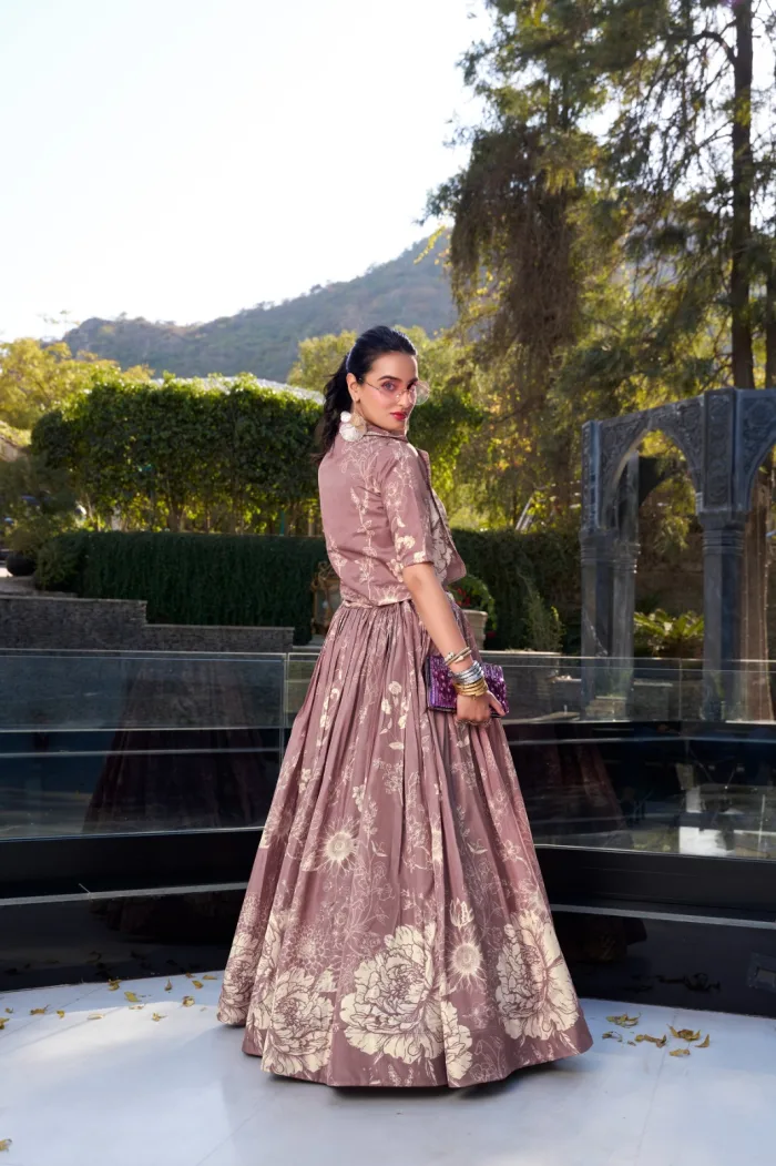 Elegant Tussar Silk floral print wedding lehenga set with blouse and koti Stitched Tussar Silk lehenga with can-can and tassels, perfect for weddings Floral print Tussar Silk blouse and koti for traditional bridal outfits Heavy flare Tussar Silk lehenga in blooming charm design for festive occasions