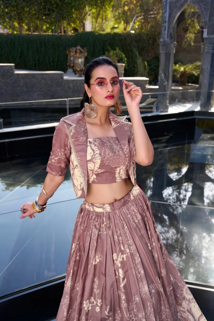 Elegant Tussar Silk floral print wedding lehenga set with blouse and koti Stitched Tussar Silk lehenga with can-can and tassels, perfect for weddings Floral print Tussar Silk blouse and koti for traditional bridal outfits Heavy flare Tussar Silk lehenga in blooming charm design for festive occasions