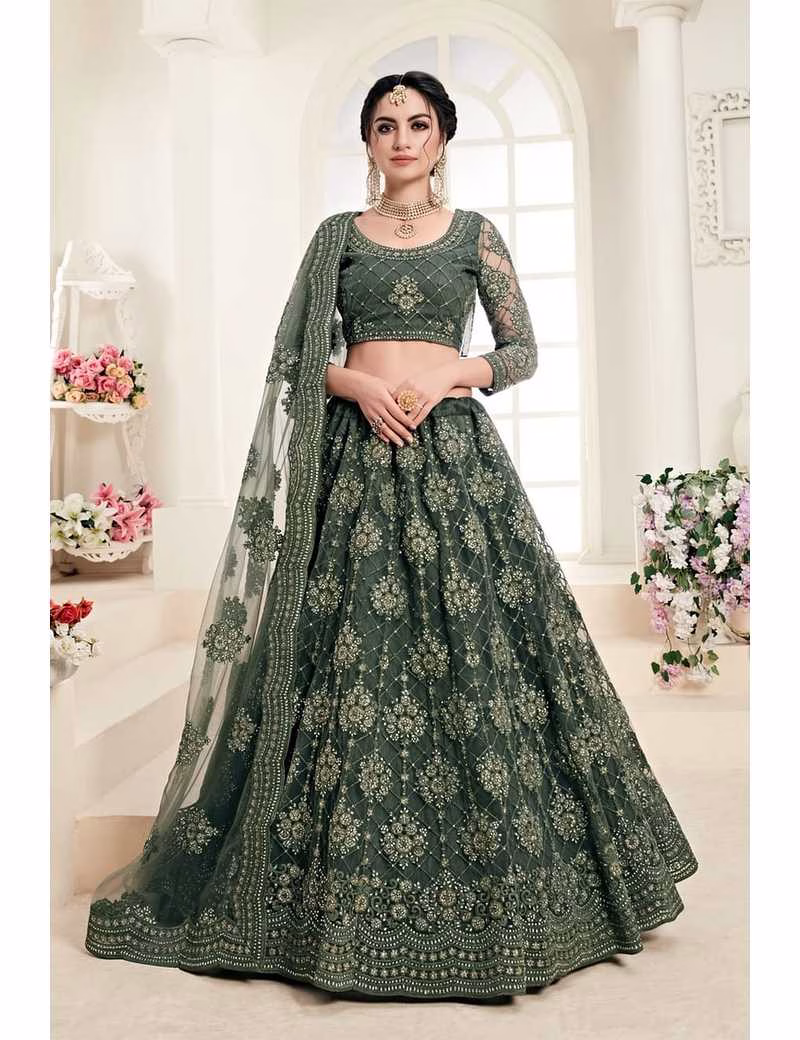 Front view of a woman wearing the Voguevive Emerald Green Embroidered Butterfly Net Lehenga Choli.